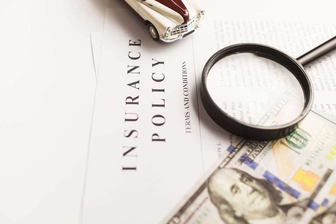 services-03 Certificate of motor insurance and policy with car and dollar bills.