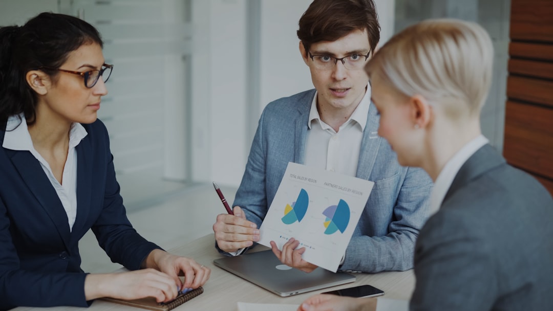 Mastering the First Impression: Your intriguing post title goes here Angry businessman disappointed with company financial reports and scolding employees sitting at the table in meeting room indoors